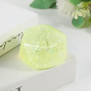 Large yellow glittery rhombus squishy maltose toy for stress relief and sensory play
