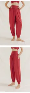 Breathable loose yoga harem pants for women in red terracotta color for pilates fitness