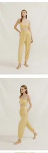 Two-panel view of yellow loose yoga harem pants with matching tube top on model