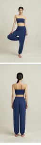 Detail of navy blue loose yoga harem pants and tube top set with back view