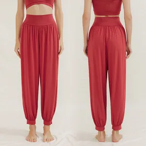 High-waist loose red yoga harem pants for pilates and dance, front and back view