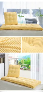 Detailed view of soft yellow corduroy cushion with thick corn kernel textured fabric.