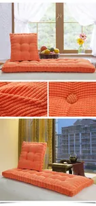 Detailed close-up and lifestyle view of orange corduroy corn grain thickened seat cushions.