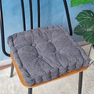 Thick grey corduroy chair cushion with 3D corn kernel texture for home office