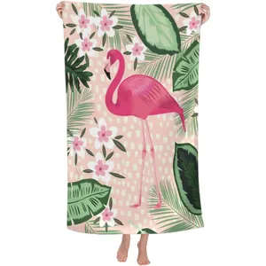 High-quality quick-dry microfiber beach towel with vibrant pink flamingo and leaf print