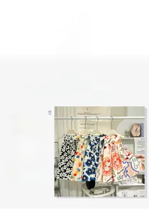 Artistic floral print sleeveless summer dresses for girls on display