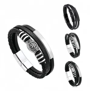 Detailed view of the three-layer braided Viking leather bracelet with magnetic clasp