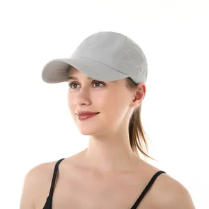 Female model wearing breathable quick-dry grey mesh baseball cap for sports use