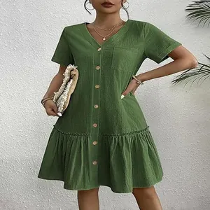 Casual green short sleeve button-down dress with ruffle hem and front pocket detail