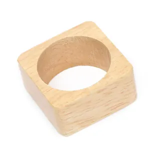 Detailed macro shot of a minimalist square wooden napkin ring with natural grain