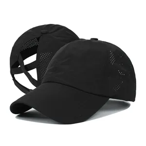 Breathable quick-dry baseball cap with ponytail criss-cross design for sports.