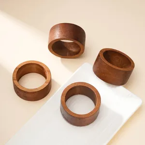 Set of 4 handmade minimalist wooden napkin rings for elegant table decor and hotels