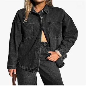 Stylish model wearing a dark grey washed denim jacket styled for an urban casual look