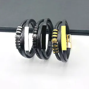 Close-up of three men's retro braided leather bracelets with magnetic steel clasps.