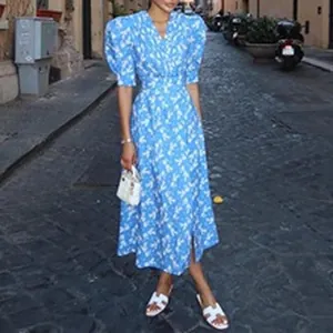 Detail of blue floral puff sleeve summer dress for women in casual street style