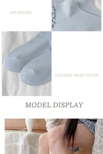 Detailed view of light blue cotton mid-calf socks with smooth seamless toe stitching