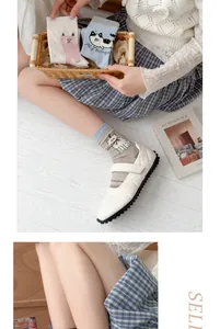 Lifestyle detail shot of cute cartoon cat pattern mid-calf cotton socks for women