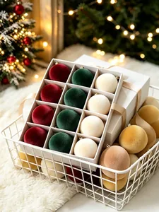 Detail view of premium flocked velvet PET Christmas balls in a white basket with festive lighting