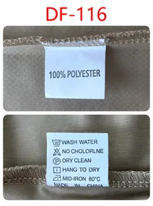 Close-up of 100% polyester fabric and wash care label for tactical polo shirt.