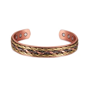 Hand-woven red copper magnetic cuff bracelet with twisted multi-tone metal design
