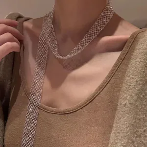 Elegant long hollowed-out glass mesh necklace with sparkling crystal texture for women