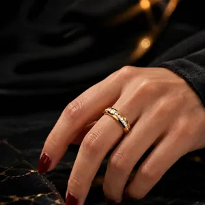 Elegant gold stainless steel women's ring with clear embedded cubic zirconia stones
