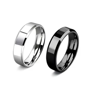 Pair of silver and black polished stainless steel minimalist band rings for couples.
