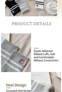 Detailed view of the embroidered bear patch on cotton crew socks with ribbed cuff.