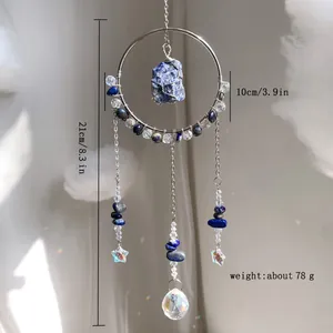 Vue détaillée d'un attrape-soleil en cristal avec lapis-lazuli et dimensions.
