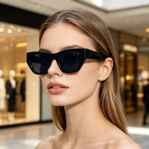 Fashionable black cat-eye sunglasses for women with UV protection for a stylish street look.
