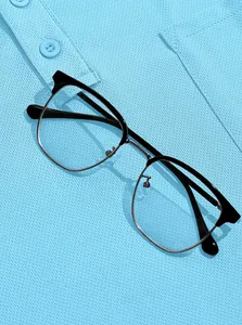Detail of light blue mesh fabric and button placket of a men's sports polo shirt