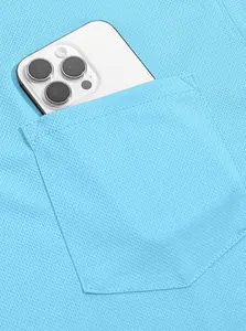 Macro detail of breathable light blue mesh Polo shirt showing functional chest pocket