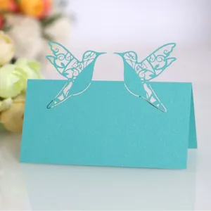 Elegant teal laser-cut hummingbird wedding place card for guest seating arrangement