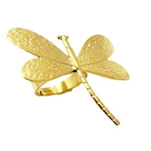 Golden stainless steel dragonfly open ring with textured wings and French luxury style