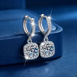 Close-up of elegant s925 silver moissanite earrings with square halo drop design