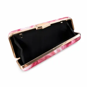 Open view of pink marble acrylic evening clutch bag with gold-tone hardware and black lining