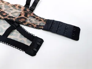 Macro detail of sexy leopard print lace bra with adjustable hook-and-eye back closure