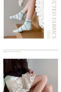 Close-up of cute Japanese style striped combed cotton socks for women