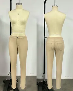 Detailed look at the front and back view of beige slim-fit stretch jeans for women.