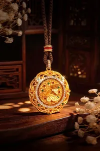 Detailed view of hollow double butterfly rotating pendant in Vietnamese sand gold