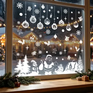 White Christmas static window stickers featuring snowflakes and Santa Claus patterns