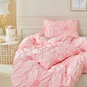 Elegante set di biancheria da letto rosa tenue con copripiumino a fiori 3D