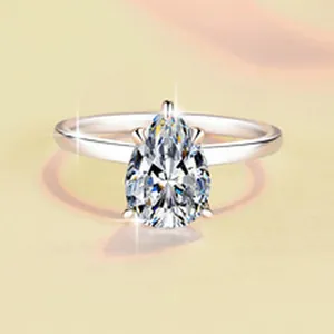 Close-up of S925 sterling silver ring featuring a sparkling pear-cut moissanite stone