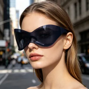 Close-up of stylish Y2K butterfly wrap-around sunglasses worn by a model in the city