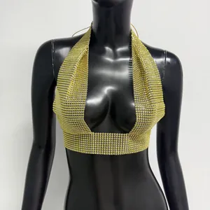 Elegant gold rhinestone mesh halter crop top with a sexy backless design detail.
