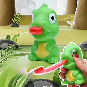 Divertido juguete antiestrés de dinosaurio verde con lengua roja que sale al apretar.