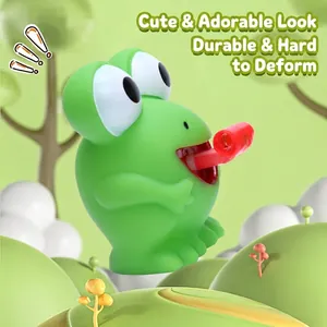 Detailed macro view of a green frog squeeze toy featuring a red whistle stress relief part