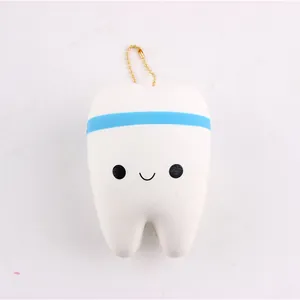 Cute smiling tooth squishy slow rebound stress relief toy with golden bead chain