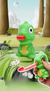 Funny green dinosaur stress relief squeeze toy featuring a red rolling tongue detail