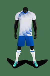 Blue and white soccer uniform set including jersey, shorts, and socks on mannequin.